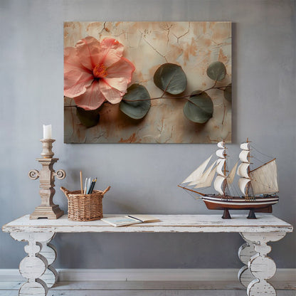 Tablou Canvas hibiscus roz si frunze verzi pe fundal rustic | The Print Studio